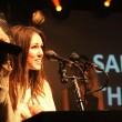 Picking up her award.